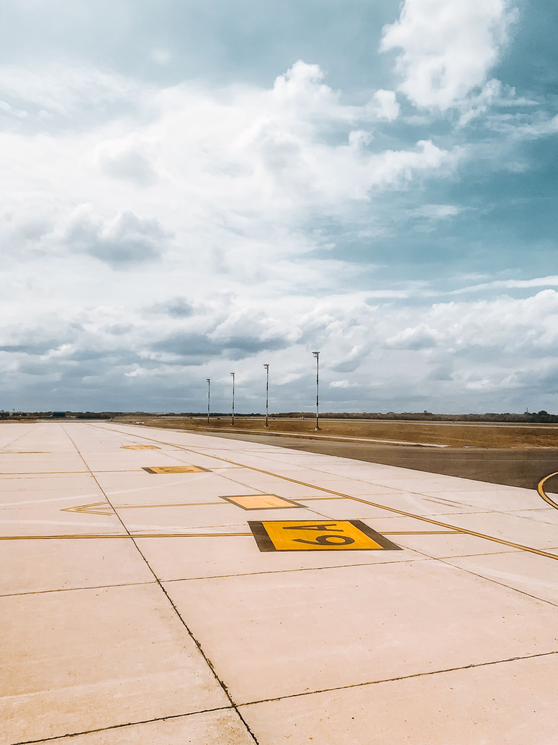 Airport terminal with travelers and flights